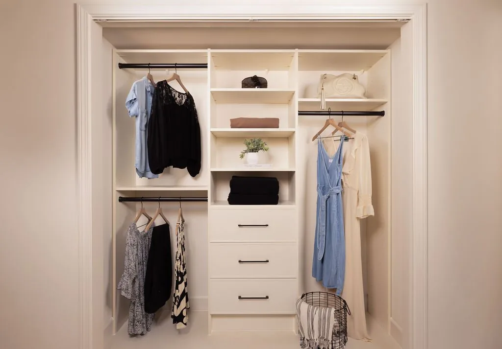 Custom closet in antique white with black hardware